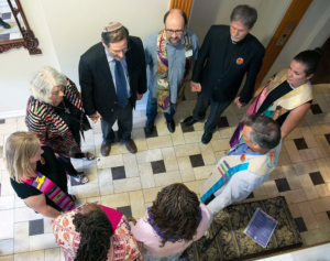 Interfaith clergy gather to bless a clinic